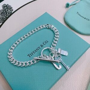Tiffany & Co. Silver Charm Toggle Bracelet with Tiffany Blue Accents